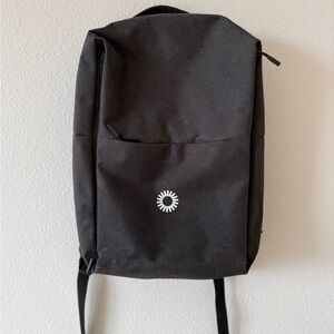 Black Minimalist Backpack with Matte Finish and Streamlined Design